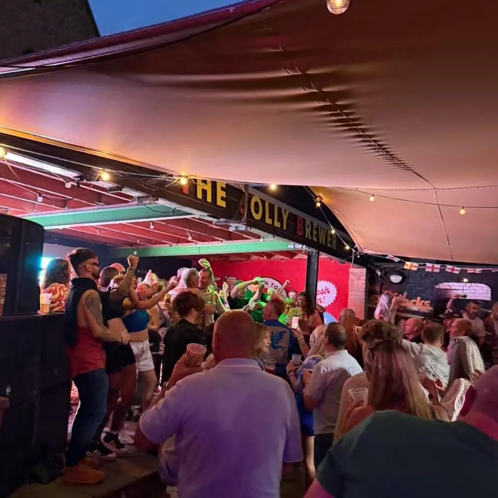 Crowd enjoying an evening event at The Jolly Brewer